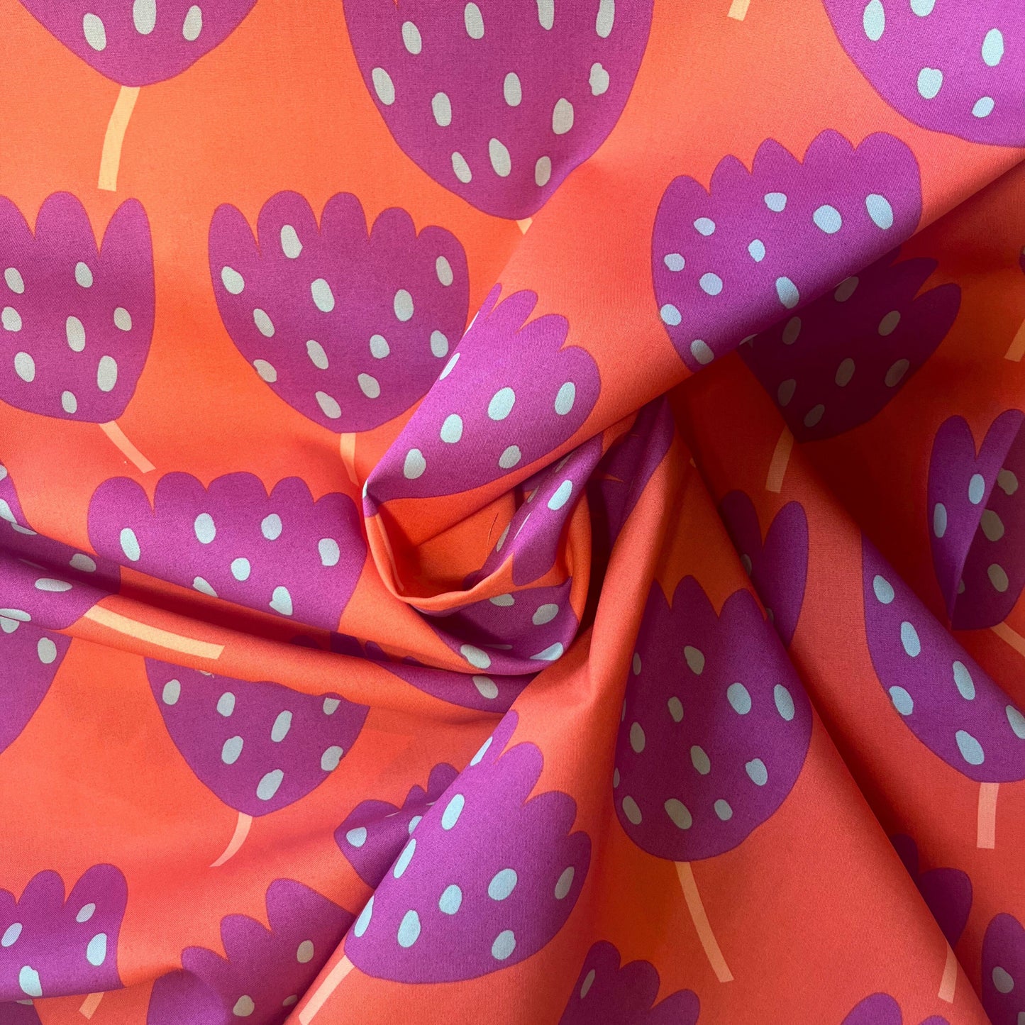 Nerida Hansen designer tulip print cotton fabric with bold colour palette – ideal for statement sewing.