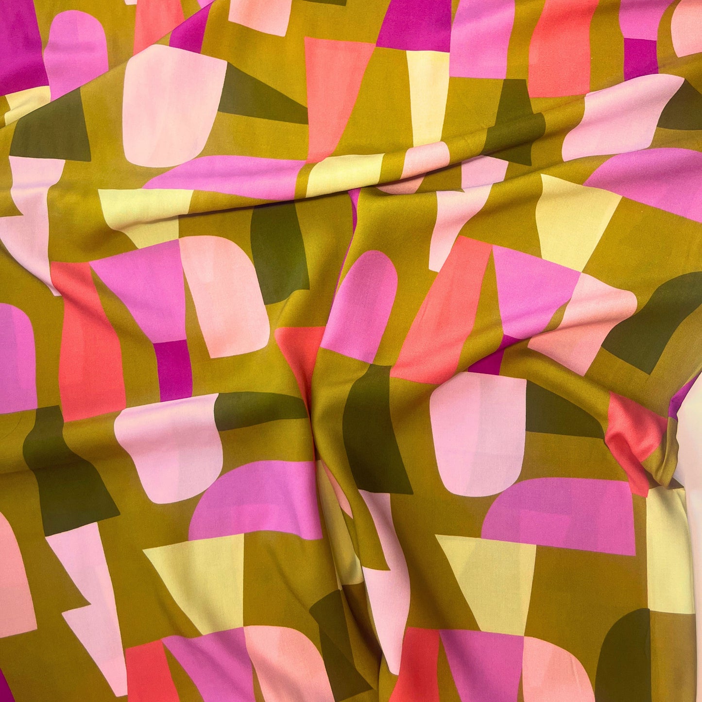Soft and breathable Moss Green ECOVERO™ fabric styled for slow fashion sewing, perfect for handmade clothing projects.
