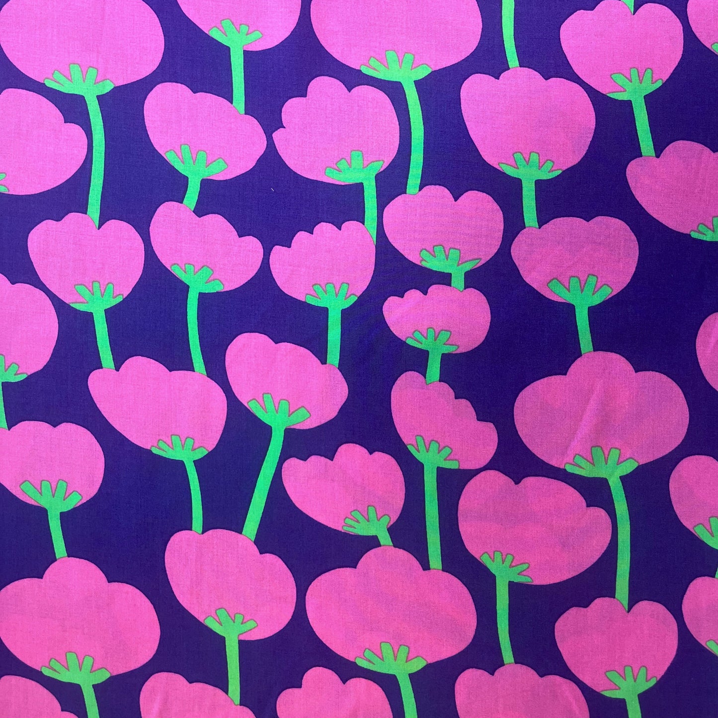 Flat lay of sustainable floral viscose fabric by Nerida Hansen, 138cm wide, lightweight and breathable.