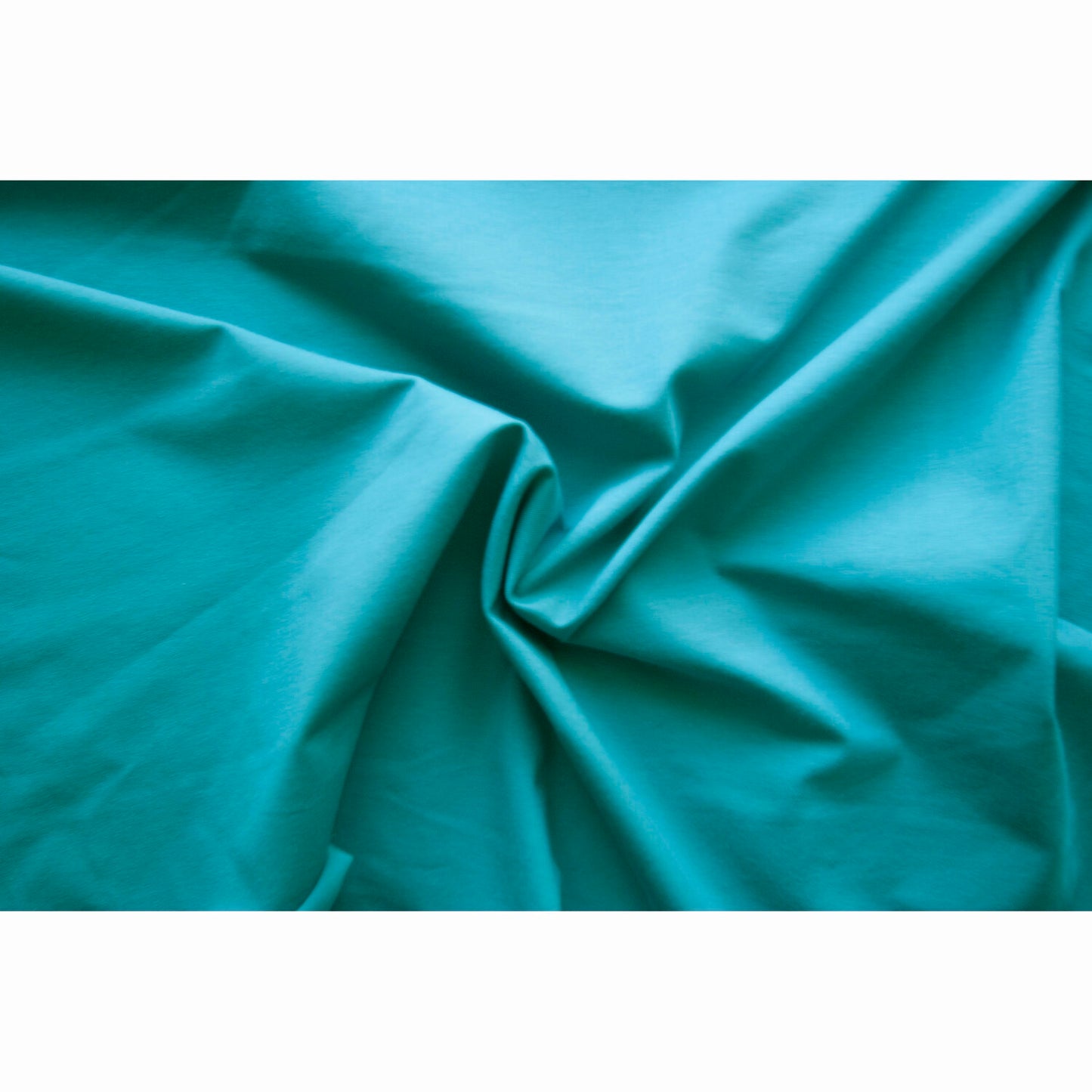 Teal Single Stretch Cotton Jersey. Sold in half meters, Oeko-Tex Standard 100.