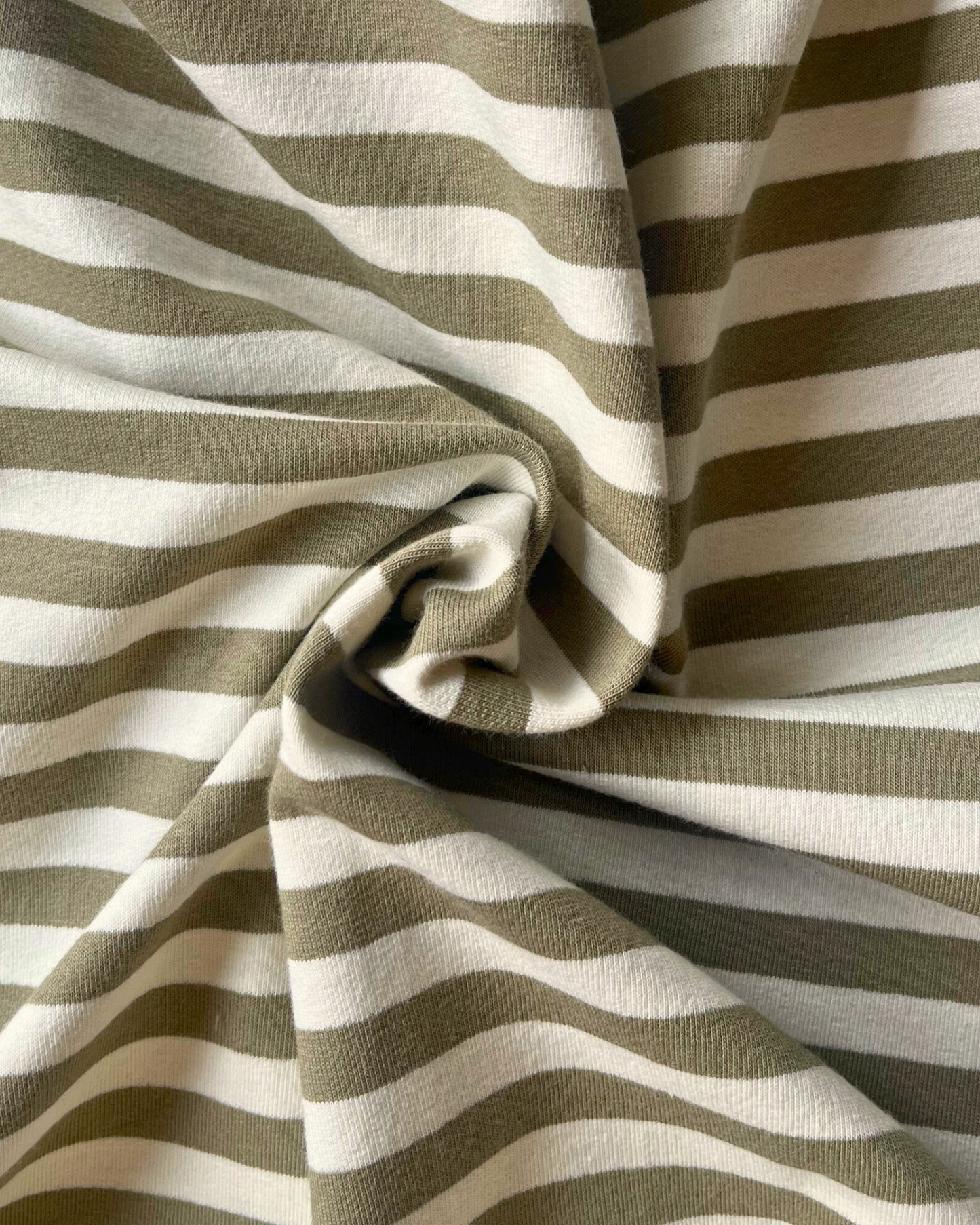 Yarn dyed stripe French terry fabric in moss green and warm white narrow equal stripes, 150cm wide — Oeko-Tex Class 1 certified cotton elastane sweatshirting for adults and children
