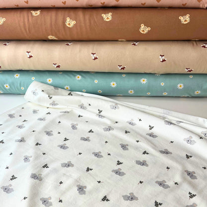 95% cotton 5% elastane stretch fabric for handmade baby clothes.