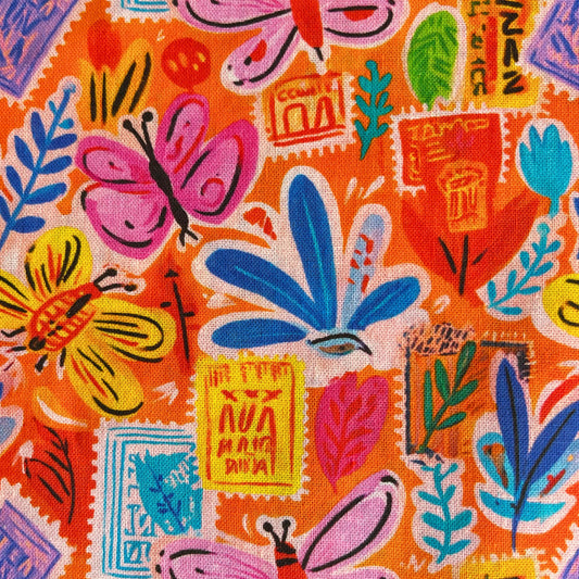 Postcard Garden cotton fabric in vibrant orange with small scattered postcard motifs, botanical prints and butterflies, 150cm wide — 100% cotton woven from Empee Studio for handmade dresses, blouses and children's clothing