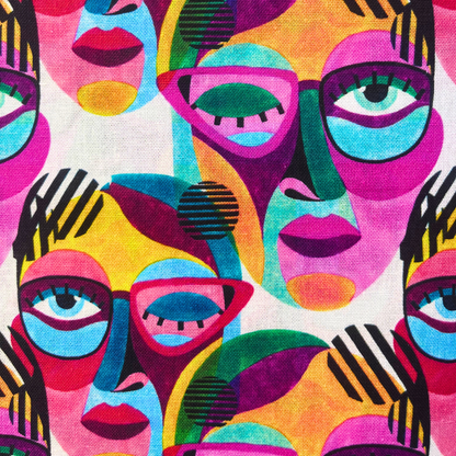 Close-up of white cotton fabric showing large scale abstract painted face print in bright rainbow colours grounded with bold black lines — Oeko-Tex Standard 100 certified Little Johnny 100% cotton woven for statement slow fashion dressmaking
