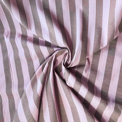 Pale pink brown 3cm yarn dyed stripe cotton fabric draped to show natural drape and 145cm width — coordinates with matching gingham for handmade children's pinafores summer dresses and blouses