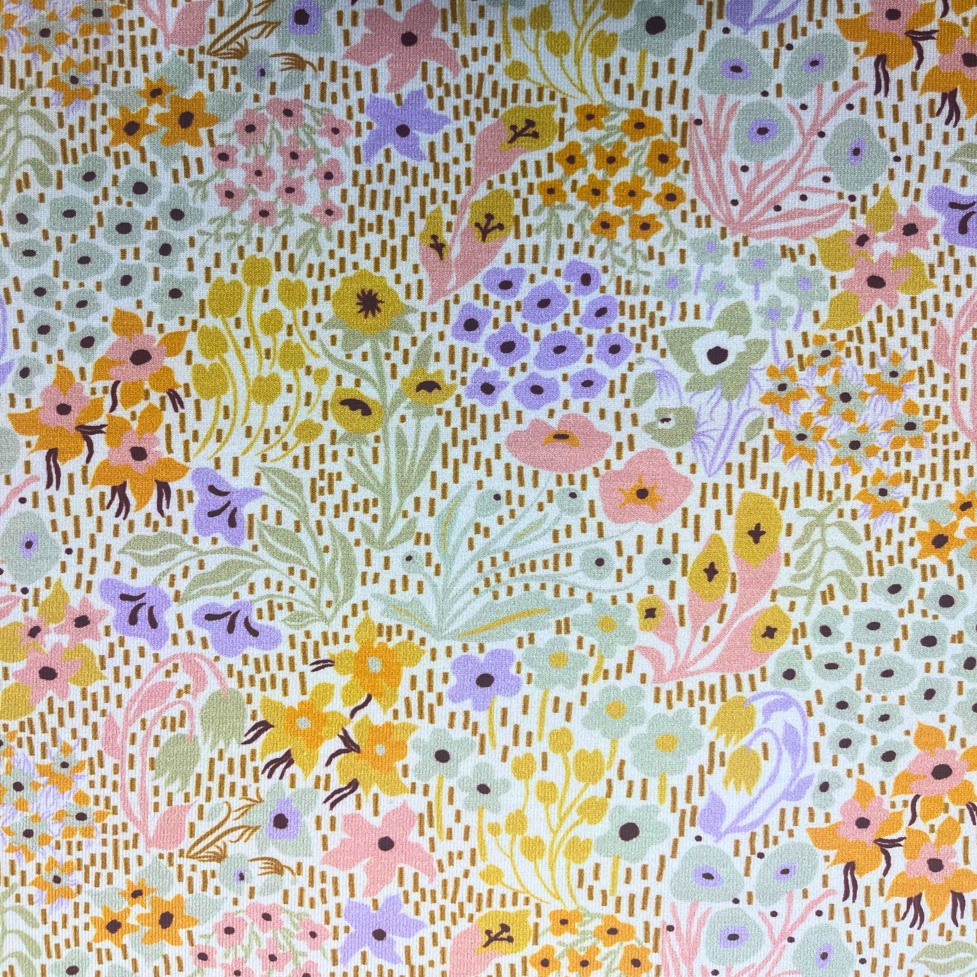 Gentle spring floral jersey fabric with 4-way stretch – great for sewing for toddlers and young children.

