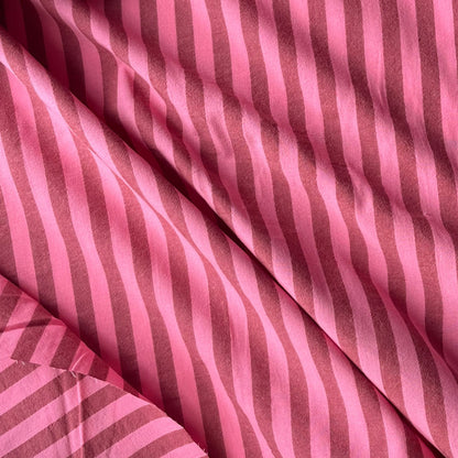 Yarn dyed cotton stripe in soft washed pink and faded red 1.25cm stripes — Oeko-Tex Standard 100 certified 100% cotton woven fabric with a beautiful sun-bleached quality for slow fashion dressmaking

