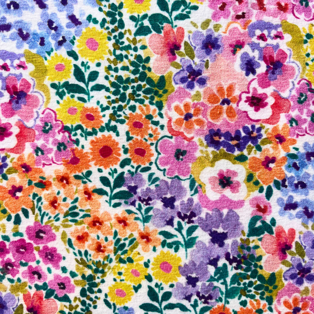 Digital flowers stretch jersey fabric in multicolour ditsy floral print, 148cm wide — soft 95% cotton 5% elastane knit ideal for handmade dresses, skirts and children's clothing