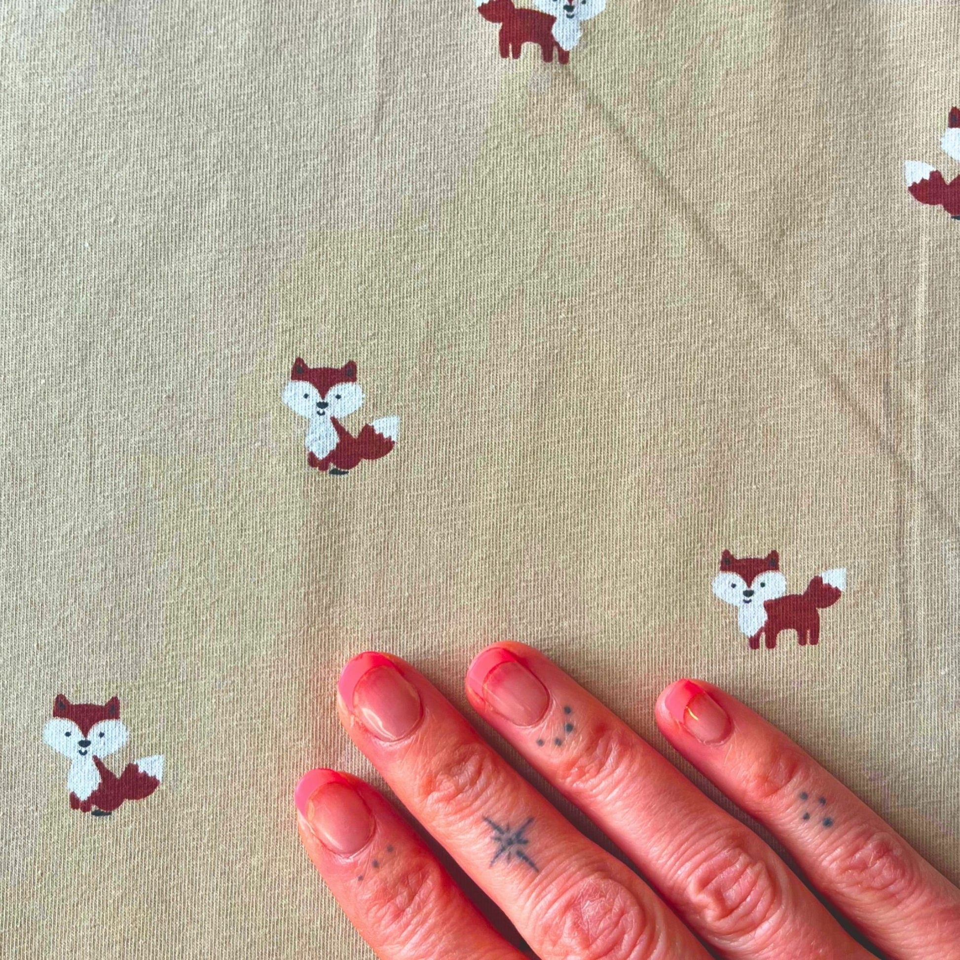 Cute woodland fox patterned jersey ideal for slow fashion children's clothing.