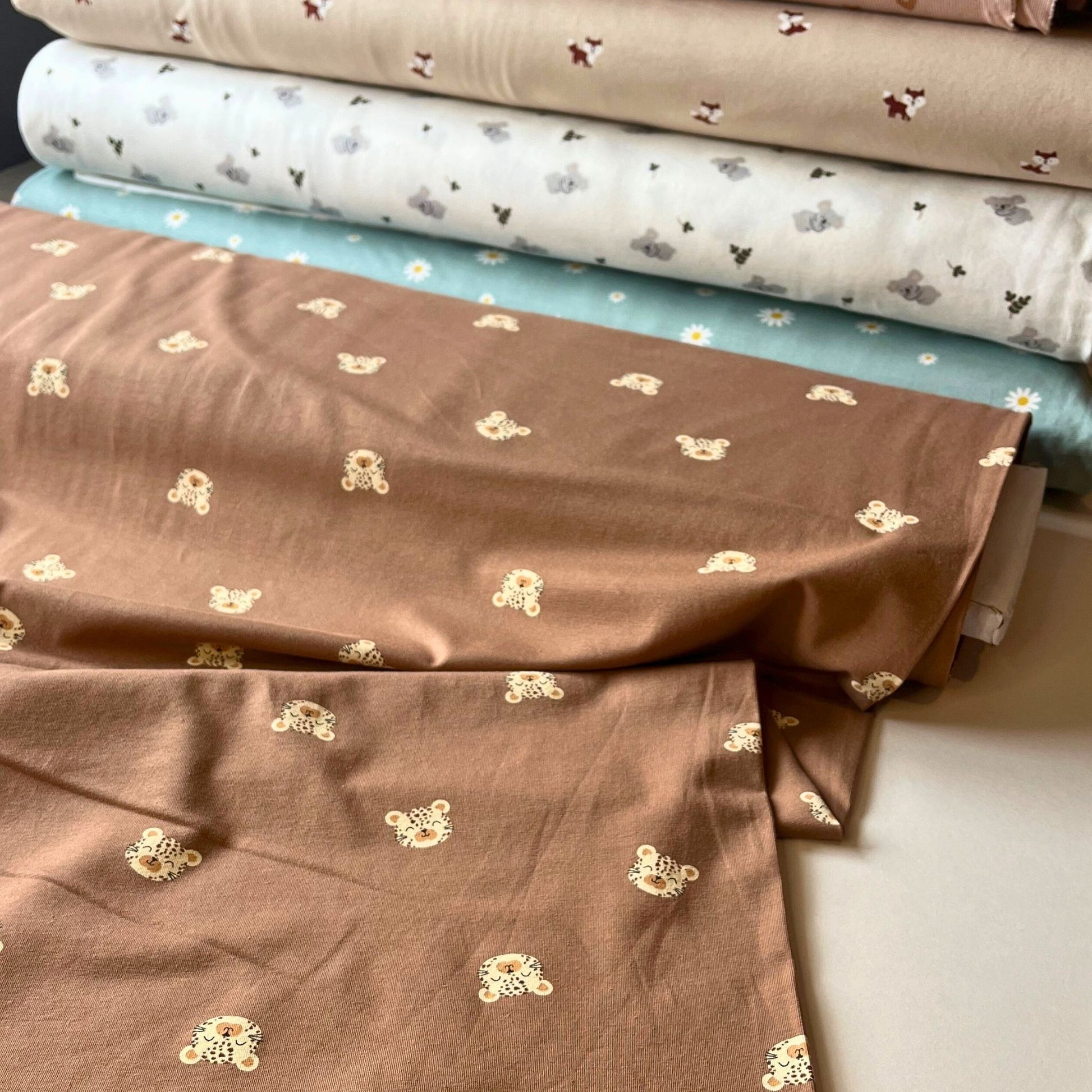 Cute and durable cotton elastane jersey fabric for slow fashion baby clothing.