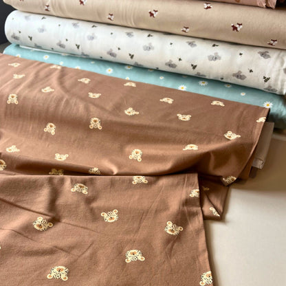 Cute and durable cotton elastane jersey fabric for slow fashion baby clothing.