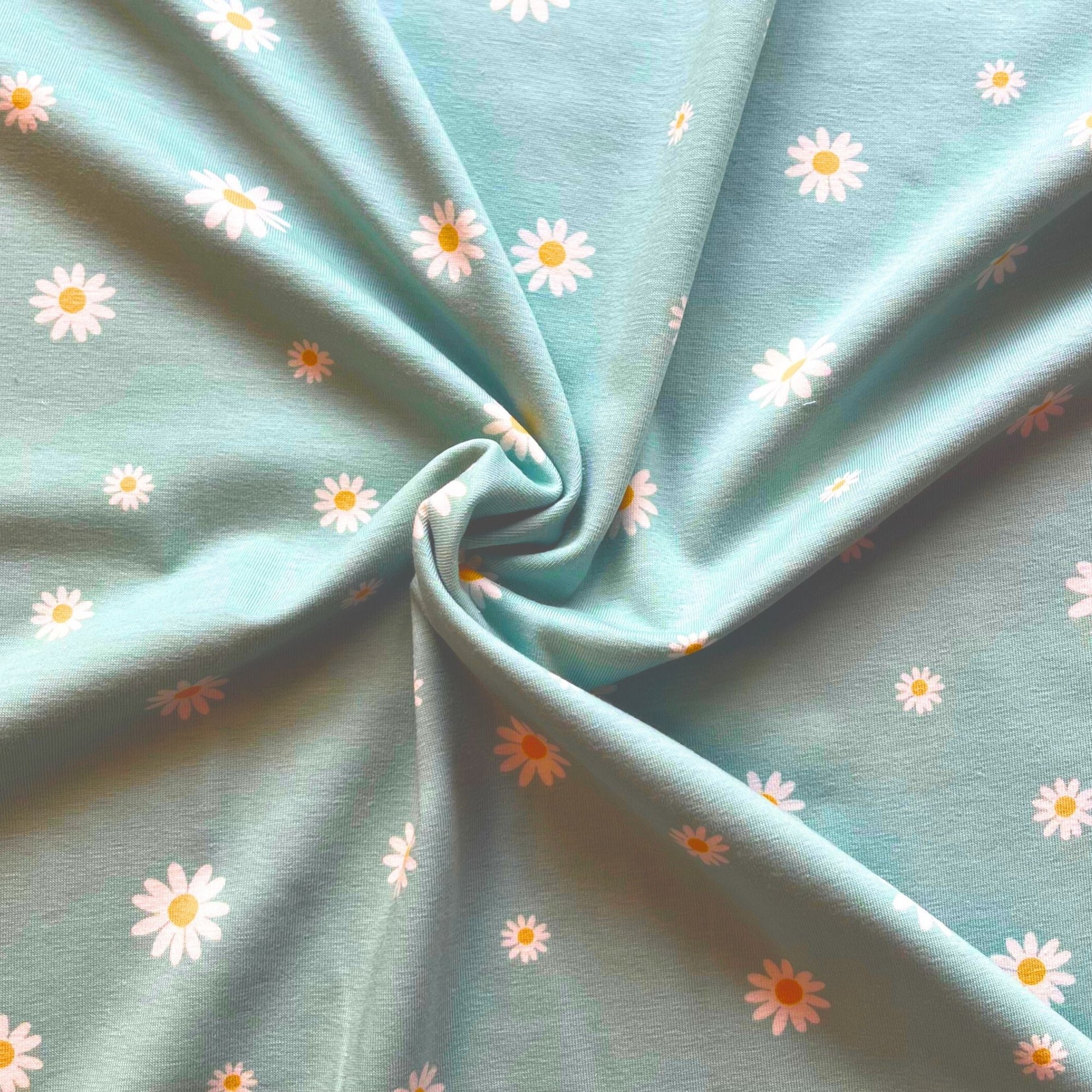 Soft Turquoise fabric with white daisy pattern