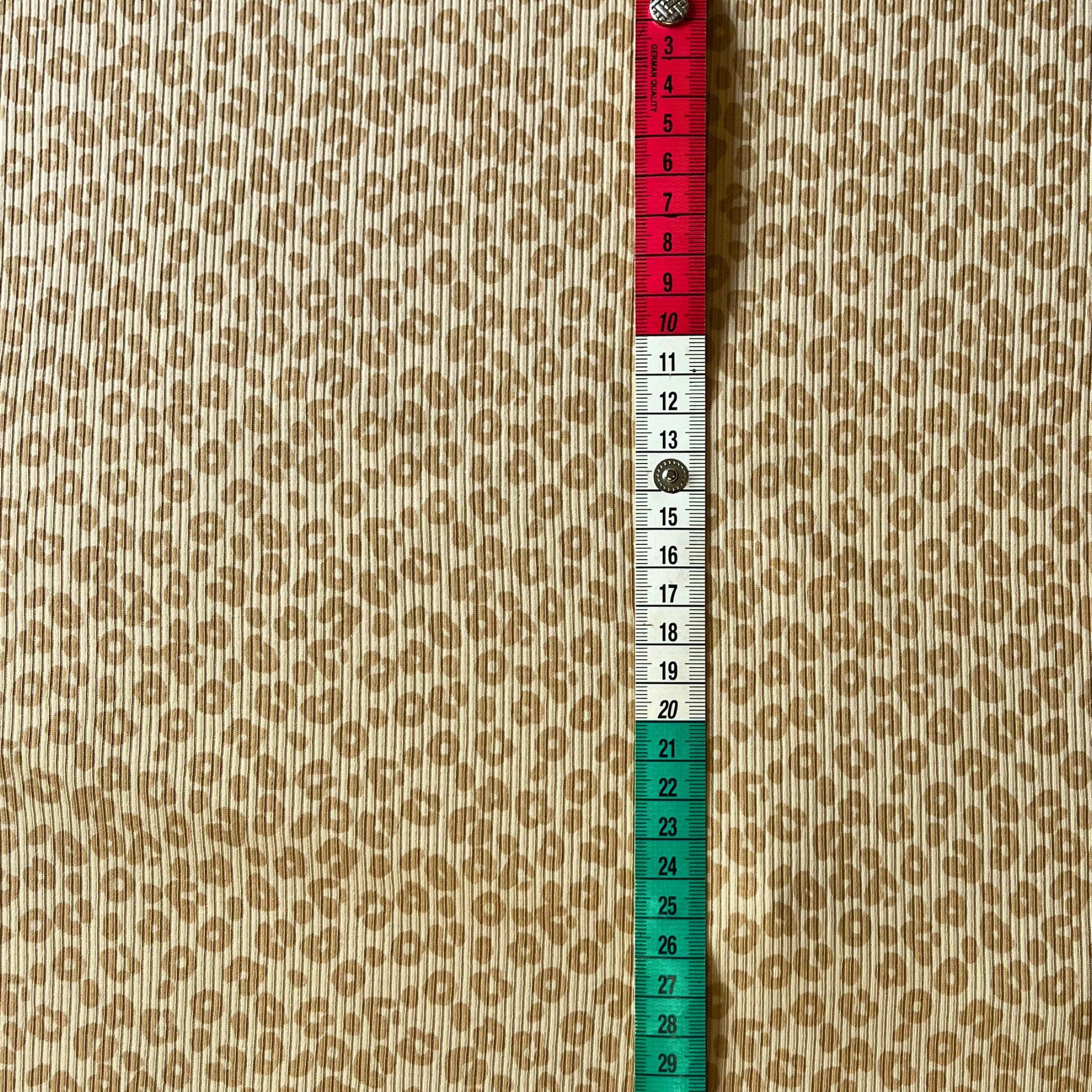 Stretchy 94% cotton 6% lycra rib jersey fabric for leggings and tops.