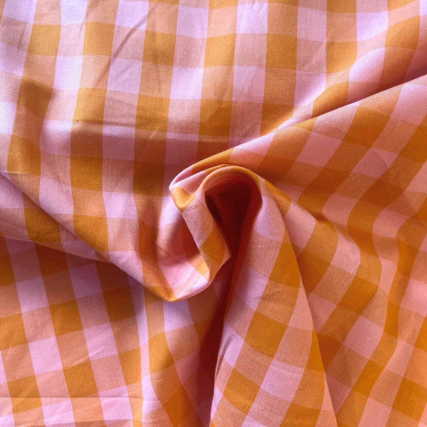 Cotton yarn dyed gingham check fabric in warm orange and salmon, 1.75cm check, 145cm wide — lightweight 115gsm 100% cotton woven fabric for handmade dresses, blouses and children's clothing