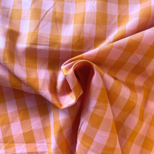 Cotton yarn dyed gingham check fabric in warm orange and salmon, 1.75cm check, 145cm wide — lightweight 115gsm 100% cotton woven fabric for handmade dresses, blouses and children's clothing