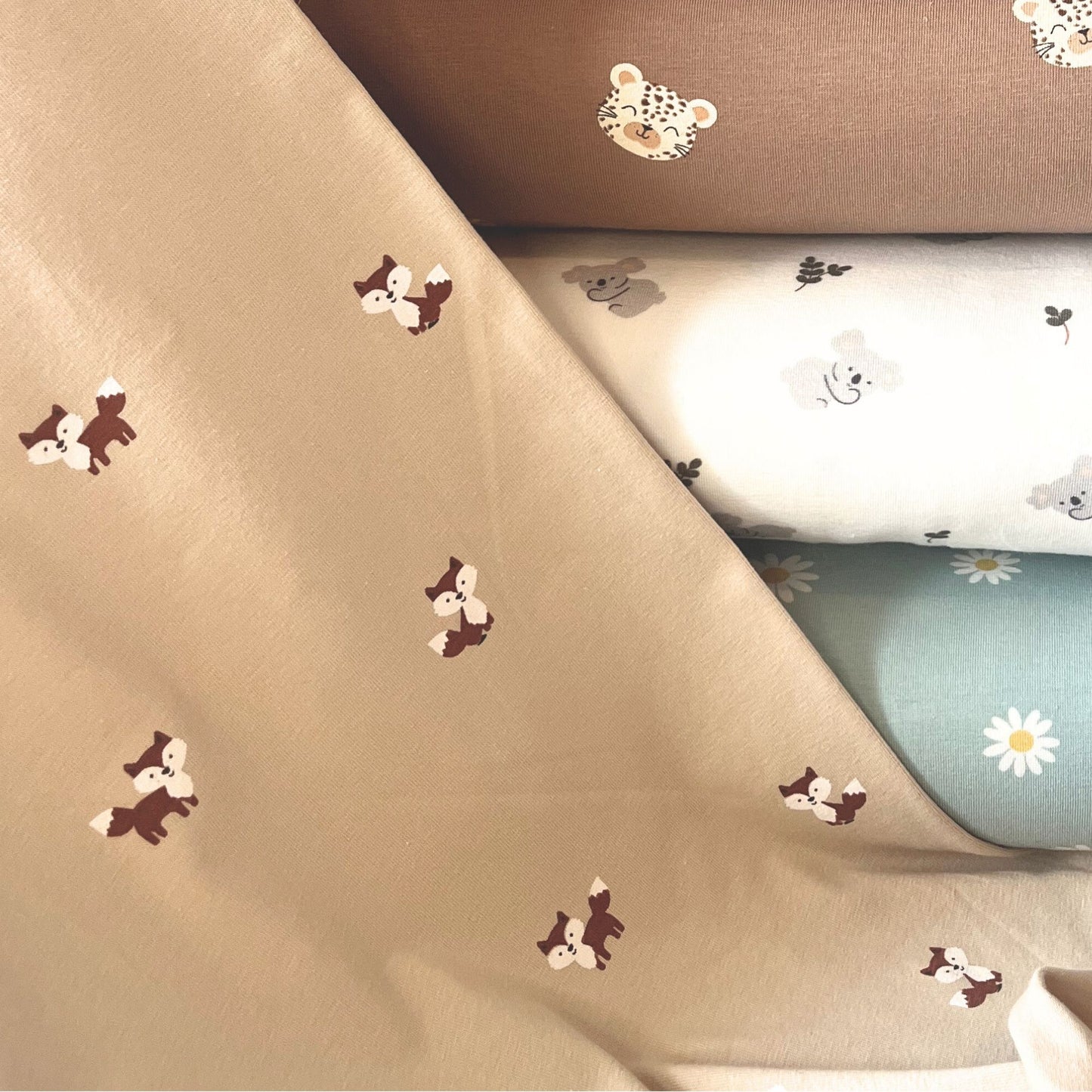 Neutral kids fabric perfect for sewing rompers, leggings and T-shirts.