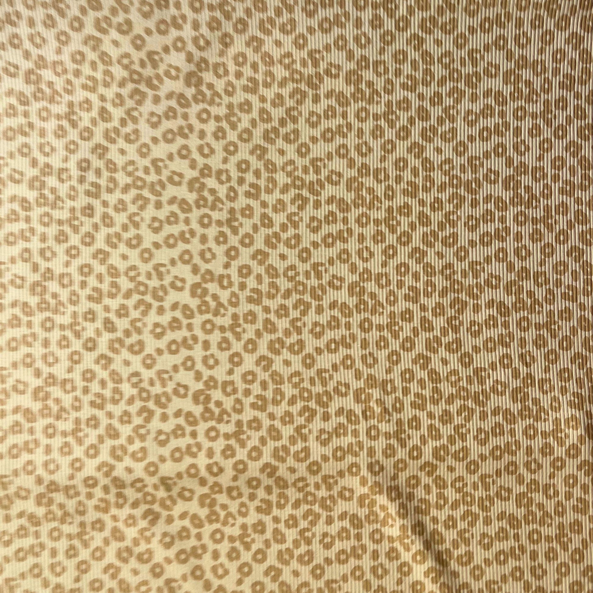 Soft and breathable rib knit fabric with subtle animal print, perfect for slow fashion sewing.