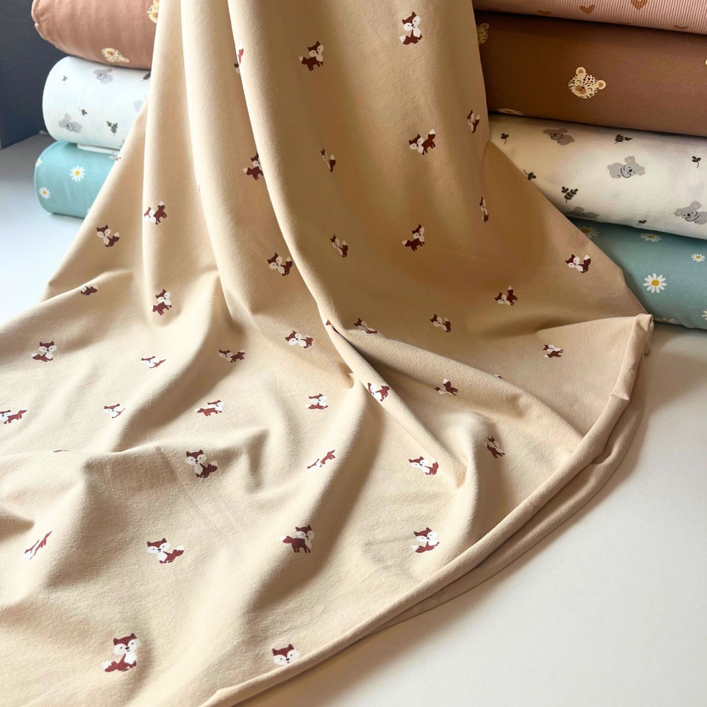 Gentle cotton elastane jersey shown draped to display soft stretch and movement.