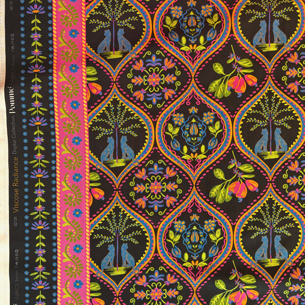 Black digital bohemian viscose fabric with leopard palm and tropical motifs in hot pink purple cobalt blue green and orange 142cm wide — 110gsm fluid woven for handmade wrap dresses midi skirts and blouses