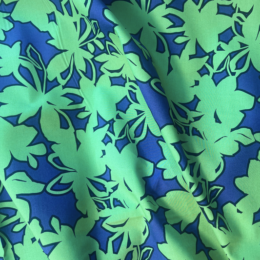 Blue and emerald green bold stencil floral cotton poplin fabric with tonal monochromatic abstract print — Oeko-Tex Standard 100 certified 100% cotton woven for slow fashion dressmaking and statement handmade garments
