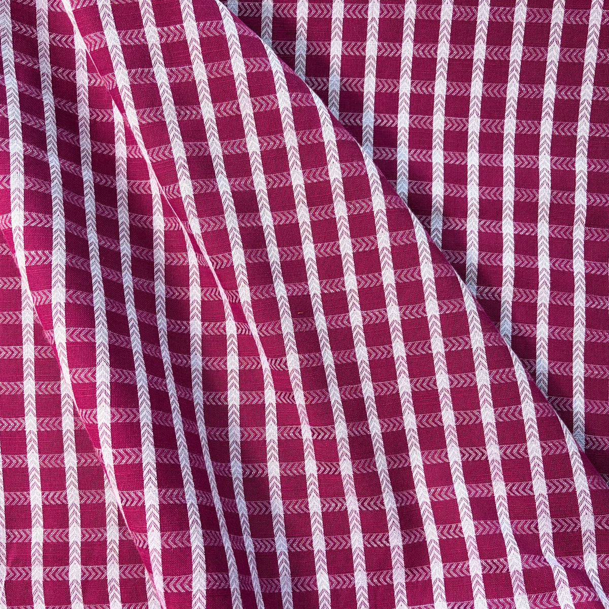 Burgundy and lilac woven dobby grid check cotton fabric 1.8cm repeat — 135gsm 100% cotton textured woven for slow fashion dressmaking children's clothing and handmade accessories