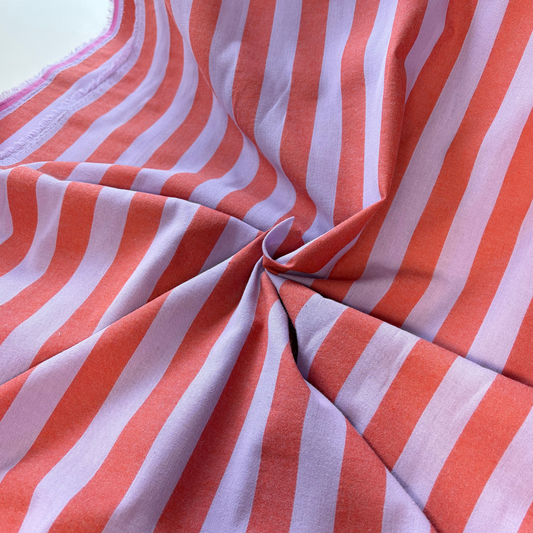 Burnt orange lavender 2.2cm yarn dyed stripe cotton fabric draped to show natural drape and 145cm width — coordinates with matching gingham for handmade children's pinafores summer dresses and blouses