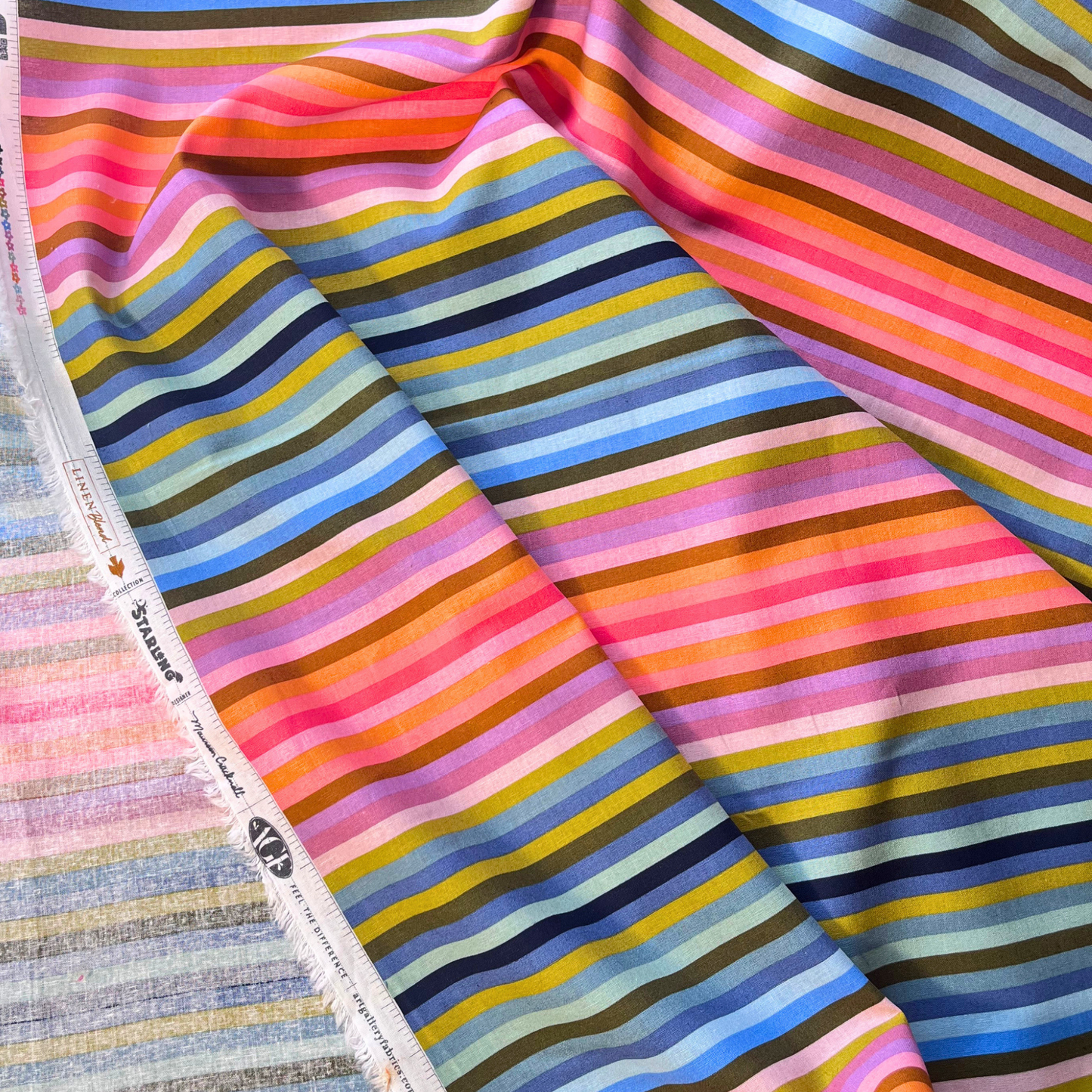 Art Gallery Fabrics Starling rainbow stripe linen cotton fabric 1cm stripes in full spectrum colourway — Oeko-Tex certified 165gsm woven linen blend for slow fashion dressmaking blouses lightweight jackets and transitional makes
